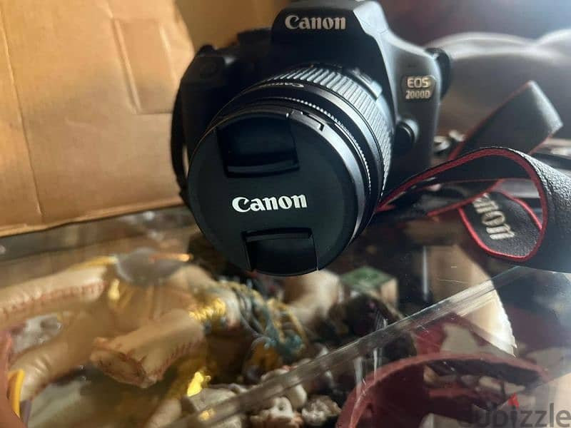 camera canoon Eos 2000 D 6