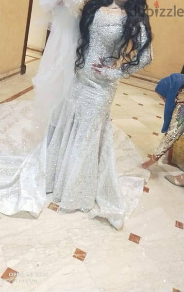 فستان زفاف لوزن ٥٠ ل٥٩ تصميم احمد فايز 2