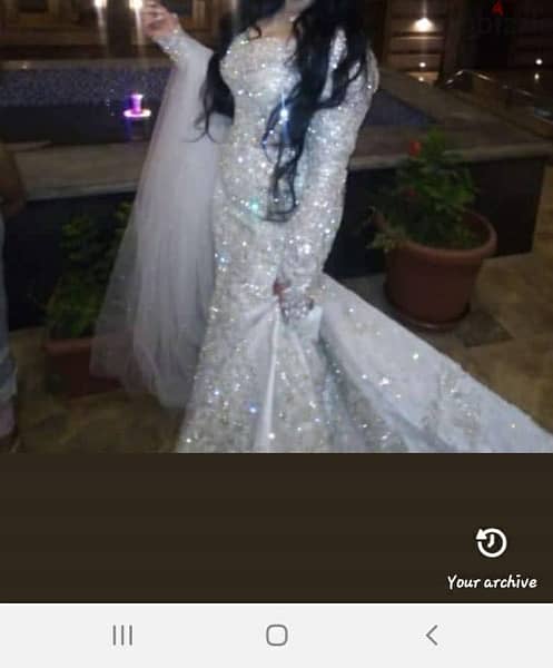 فستان زفاف لوزن ٥٠ ل٥٩ تصميم احمد فايز 5