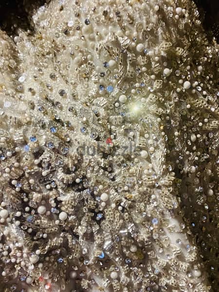 فستان زفاف لوزن ٥٠ ل٥٩ تصميم احمد فايز 8