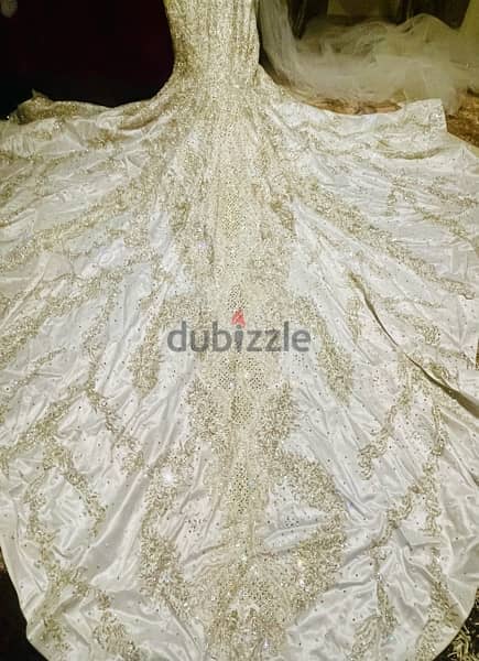 فستان زفاف لوزن ٥٠ ل٥٩ تصميم احمد فايز 9