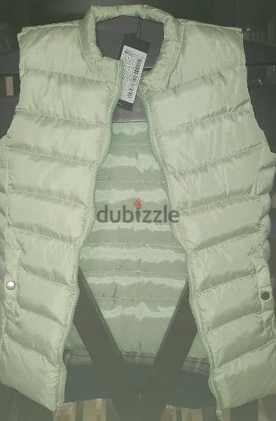 Vest new size L