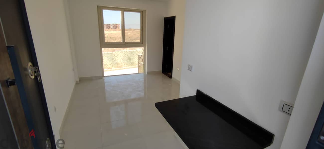 Near Marassi village, finished chalet with private garden, 40 sqm, for sale on the North Coast, directly on the sea, for sale in installments, deliver 5