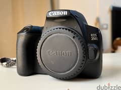 Canon 250D body with 18-55mm lens