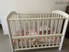 adjustable baby crib ( slightly used)