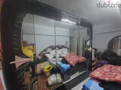 غرفة نوم زان مكونة من دولاب بلاكار و سرير بكمود متصل و تسربحة