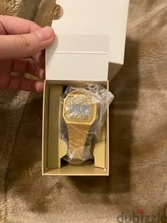 Casio Unisex Illuminated Digital Dial Gold Tone Stainless Steel Band