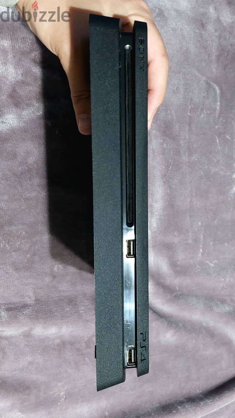 PS4 Slim 1T بالكرتونة و الكتالوجات 3