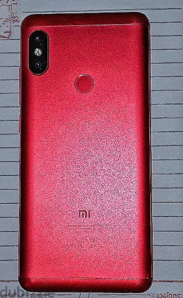 ([شاومي نوت 5 نسخة ال3 رام و32 ذاكرة]) مع جراب احمر زي لون التلفون 5