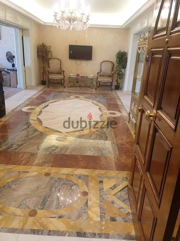 شقة للبيع في مصر الجديدة في ابراج عثمان ميدان روكسي تشطيب سوبر لوكس 1