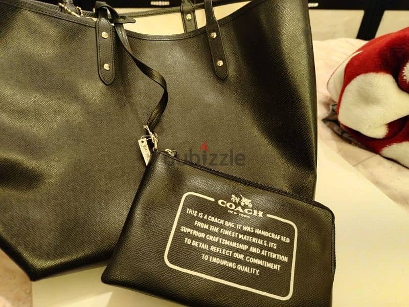 Brand new 100 % original double face coach handbag. 2