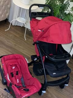 Joie Baby Stroller - Cranberry with a car seat