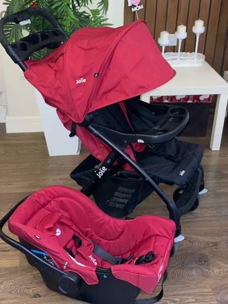 Joie Baby Stroller - Cranberry with a car seat 1