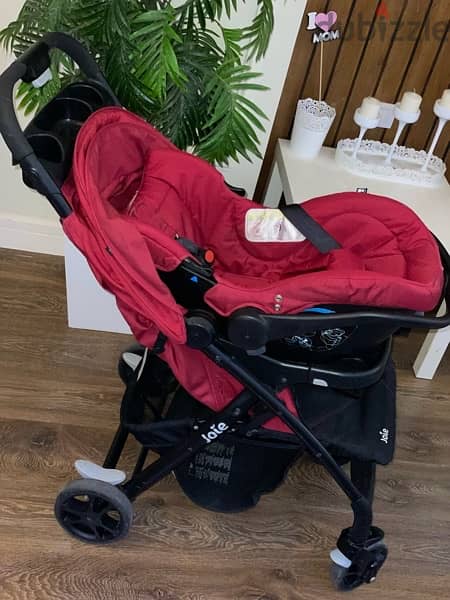 Joie Baby Stroller - Cranberry with a car seat 2