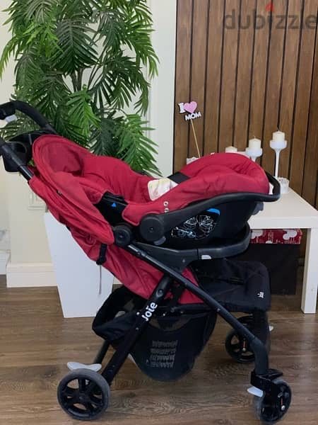 Joie Baby Stroller - Cranberry with a car seat 3