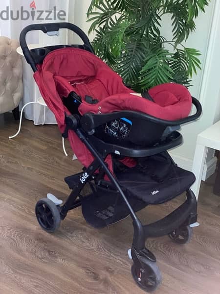 Joie Baby Stroller - Cranberry with a car seat 4