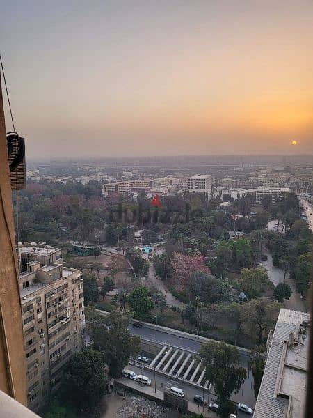 شقة رائعة بانوراما جامعة القاهرة وحديقة الحيوان ترى الأهرامات والنيل 7