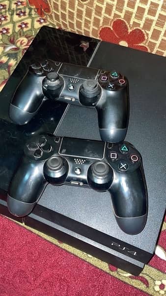 playstation 4 with controllers 2