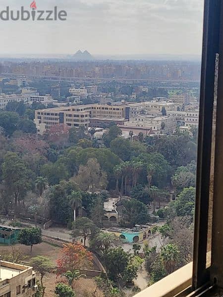 شقة رائعة بانوراما جامعة القاهرة وحديقة الحيوان ترى الأهرامات والنيل 18