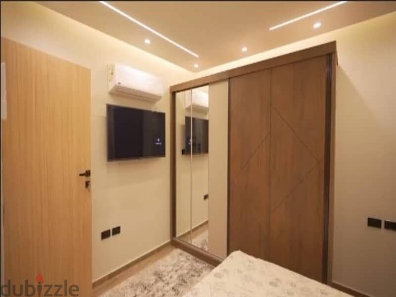 in Azad Compound Modern Furnished Apartment for Rent with kitchen + ACs + Smart Home 8