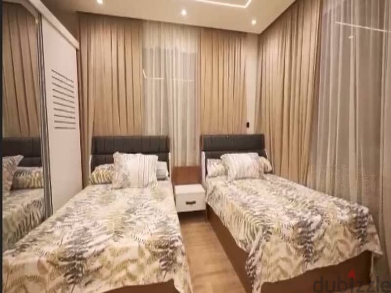 in Azad Compound Modern Furnished Apartment for Rent with kitchen + ACs + Smart Home 10