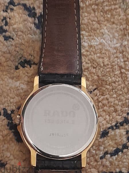 ساعة رادو سويسري اصلي مطلية بالذهب اوستيك جلد ثعبان 2