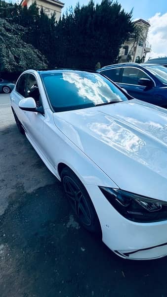 c180 amg sport for sale whiteXred interior للبيع سي ١٨٠ ابيض فرش احمر 5