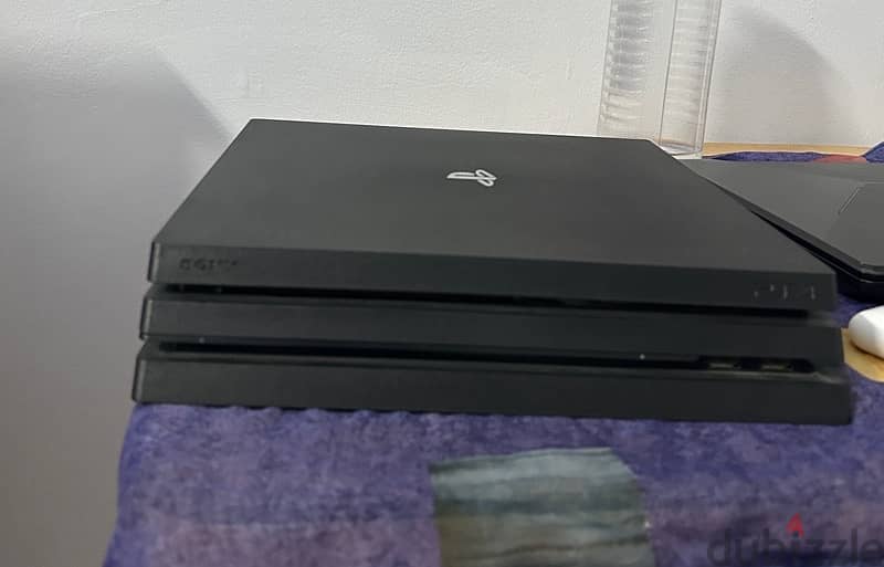 ps4 pro with 2 original controllers 0