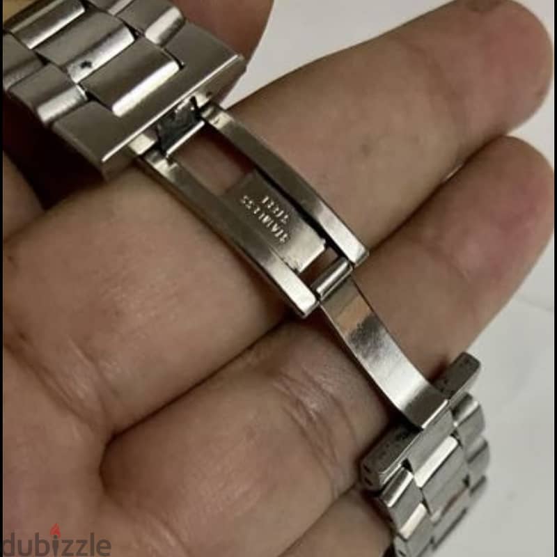 Original Movado Eliro  Swiss Made unisex Watch quartz كالجديده 9