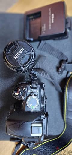 Nikon D3100 with 18-55 lens 0