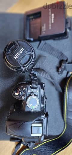 Nikon D3100 with 18-55 lens