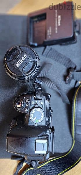 Nikon D3100 with 18-55 lens 0
