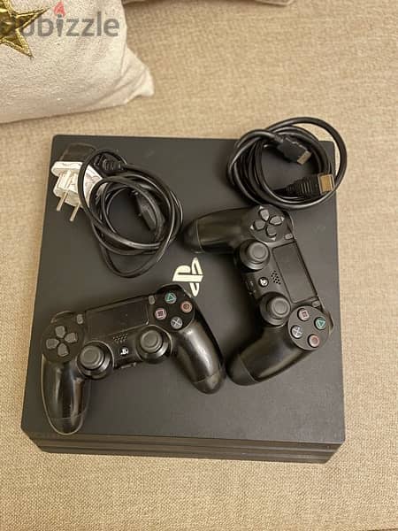 PlayStation 4 pro 1 TB & two original controllers 1