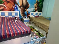 غرفه اطفال خشب زان (عدد ٢ سرير مقاس ١٢٠+ دولاب + كمود )