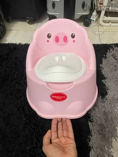 Potty training seat with lid