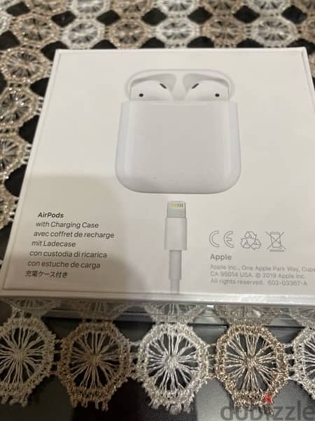 Apple AirPods 2nd Generation With Charging Case - White new 1