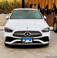c180 amg sport for sale white with red interior للبيع سي ١٨٠ سبورت