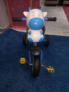 عجلة اطفال علي شكل cow ب3عجلات بكرسي وزرار ساوند ميوزك ومكان حجارتين 0