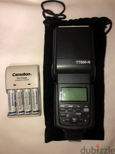 Godox TT680-N i-ttl for Nikon flash with camelion charger 1