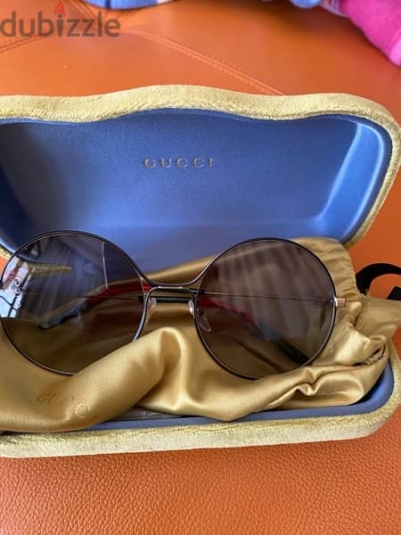 sunglasses from Gucciand Bulgari 1