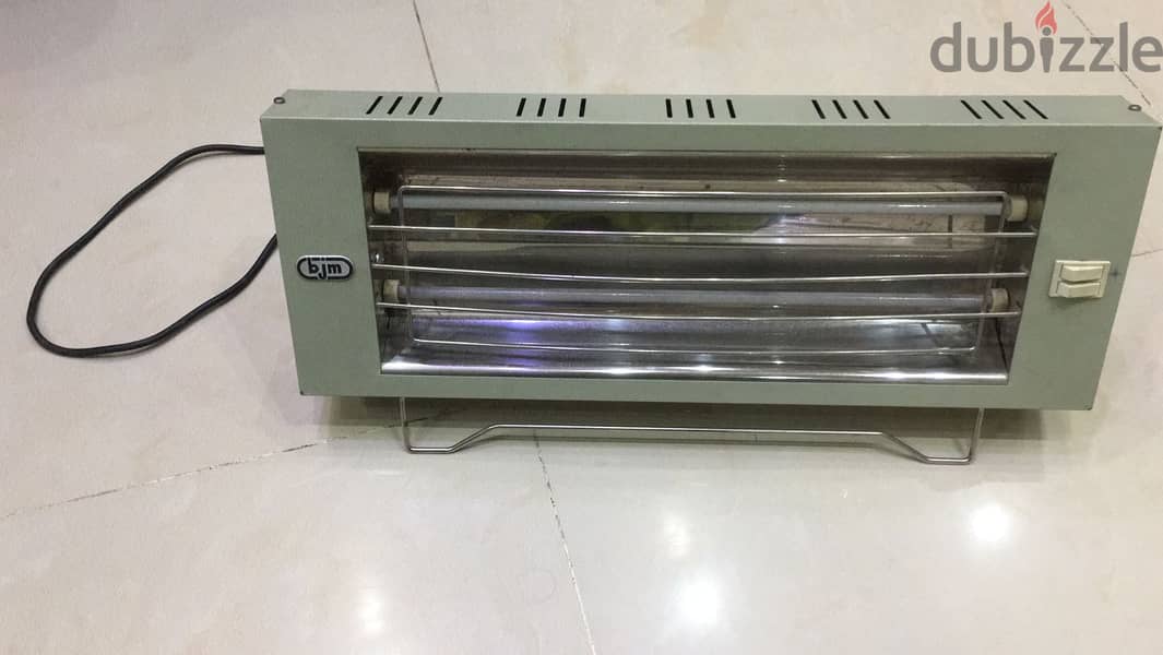 دفايه كهربائيه ايطالي اوريجنال شمعتين 1500W 1