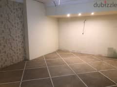 A 245 sqm commercial store, two floors, for rent on Gamaet Al-Dawal Street
