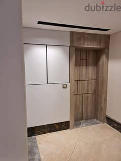 Fully finished apartment with air conditioners in Fifth Settlement, installments over 10 years, in Palm Hills New Cairo, minutes from the American U