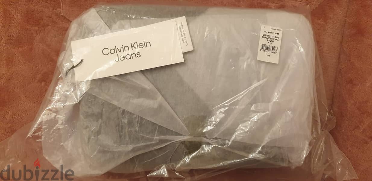 كالفن كلاين شنطة يد - Calvin Klein Jeans POUCH UNISEX - Clutch - CK 7