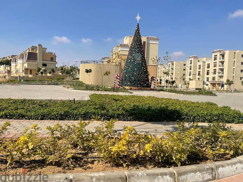For sale, an apartment with a garden, 113 square meters, in front of the Capital Airport in New Cairo 2