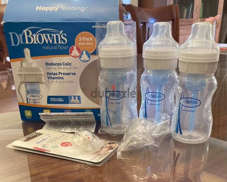 Dr Brown anticolic 9 oz 3 bottles + 5 teats+ pacifier 1