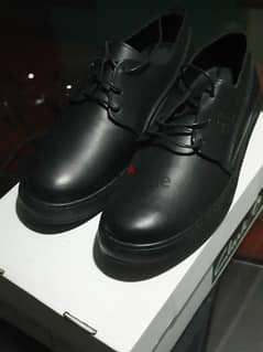 black shoes genuine leather