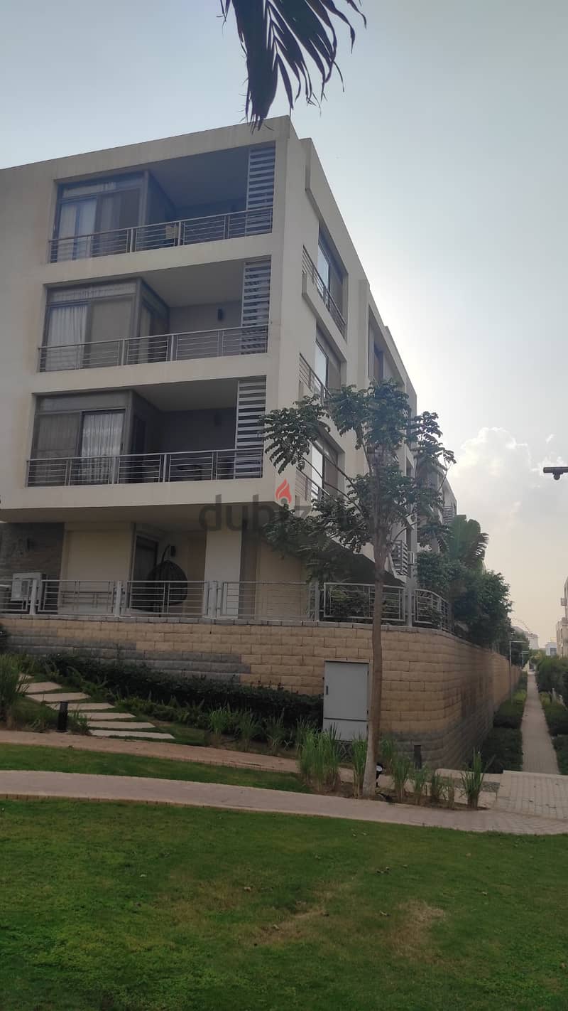 126 sqm apartment with roof for sale in the First Settlement in front of Cairo Airport in installments in Taj City Compound 9