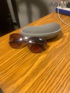 VOUGE SUNGLASSES (ORIGINAL) With the serial number 0