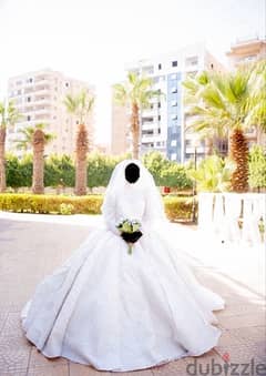 فستان زفاف في حالة ممتازة سليم ١٠٠٪؜